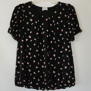 NWOT. Lady Top with Ruffles Sleeves and Elastic Bottom.